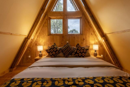 Bed at Munazi Eco Lodge 